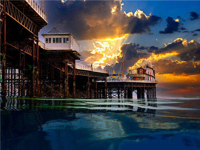 Sunset at the Palace Pier in Brighton By Brian Roe