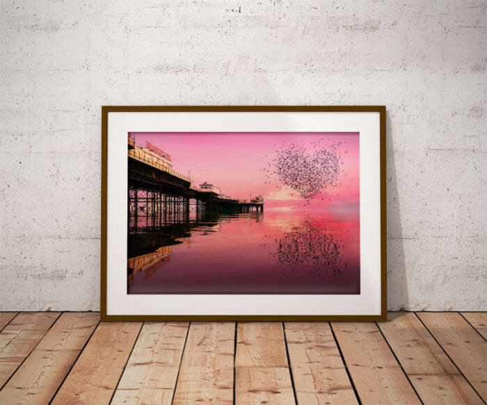 Palace Pier Love Heart Murmurations in frame By Brian Roe