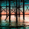 Palace Pier Brighton. Iron Work in the Sunset by Brian Roe
