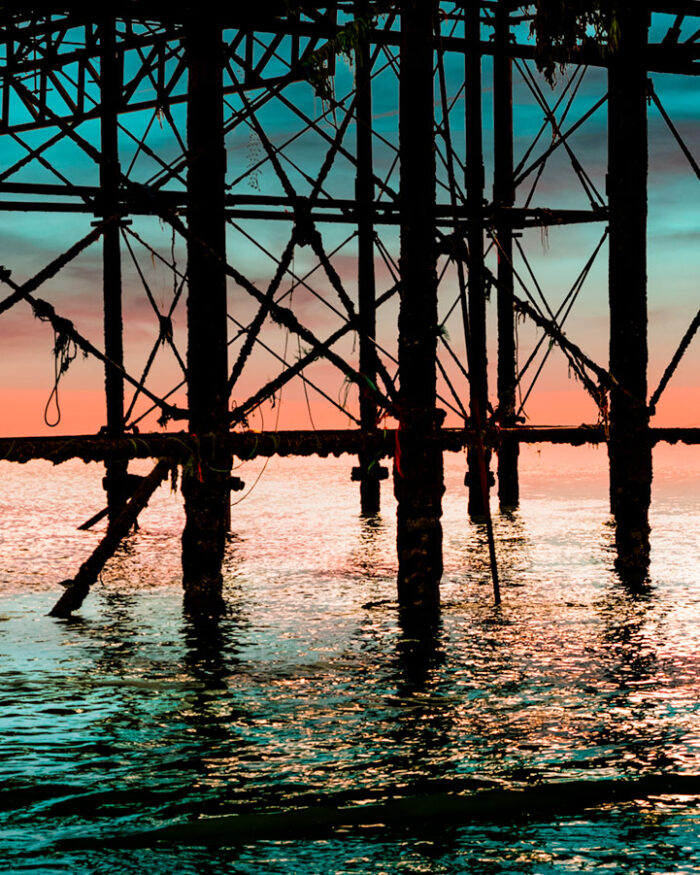 Palace Pier Brighton. Iron Work in the Sunset by Brian Roe