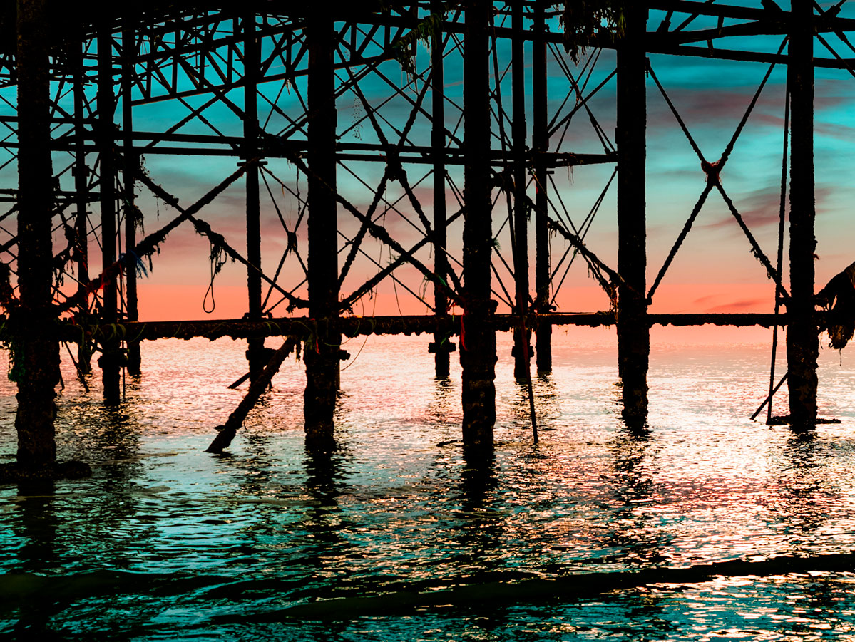 Palace Pier Brighton. Iron Work in the Sunset by Brian Roe